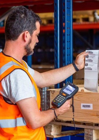 Businesswoman using laptop in modern office